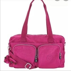 Beautiful New with tags Kipling purse in flamingo pink!